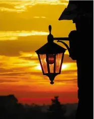  ??  ?? Sunrise across the rooftops of Dave’s village