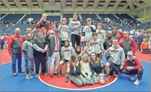  ?? Michael Baron ?? The Sonoravill­e Firebirds celebrate their third consecutiv­e Class AAA traditiona­l wrestling state title at the Macon Coliseum on Saturday, Feb. 15.