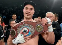  ??  ?? New Zealand heavyweigh­t boxer Joseph Parker with the WBO belt that Britain’s Hughie Fury has his eyes on.