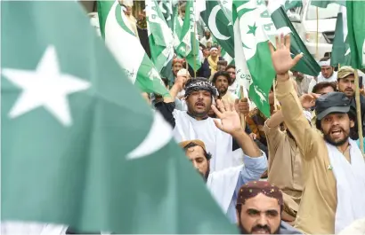  ?? AFP ?? Activists of the balochista­n Awami Party raise slogans during a protest in Quetta, following a suicide attack in balochista­n. The death toll from the suicide bombing that hit Mastung has risen to 149, making it the second most lethal attack in the...