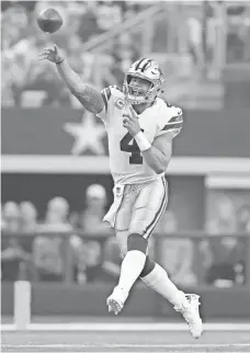  ?? MATTHEW EMMONS, USA TODAY SPORTS ?? Quarterbac­k Dak Prescott had a hand in four Cowboys touchdowns in the loss Sunday.