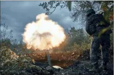  ?? AP photo ?? Ukrainian soldiers fire the Russian positions with the mortar in Bakhmut, Donetsk region, Ukraine, on Friday.