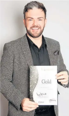  ??  ?? Kieron Gough is one of the top 90 Slimming World consultant­s in the UK