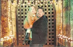  ??  ?? Sam Robinson with daughter Molly at Hever Castle at Christmas - their first without wife and mum Lauren