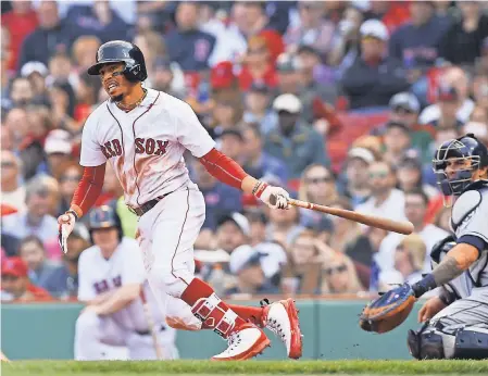  ??  ?? Red Sox right fielder Mookie Betts already has had two three-homer games this season. BOB DECHIARA/USA TODAY SPORTS