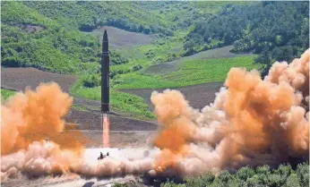  ?? AP ?? July’s launch of an interconti­nental ballistic missile in North Korea was but one act of provocatio­n by Kim Jong Un’s regime. The leader last week threatened to send missiles toward Guam.