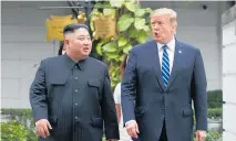  ?? Photo / AP ?? Kim Jong Un and Donald Trump appeared to be getting along well as they walked together on Thursday but US Secretary of State Mike Pompeo appeared shaken as Trump gave his version of why the talks were cut short.