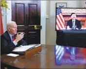  ?? Susan Walsh Associated Press ?? PRESIDENT BIDEN meets virtually with China’s Xi Jinping from the White House last November.