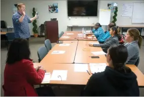  ?? RECORDER PHOTO BY CHIEKO HARA ?? Burton School District instructio­nal technology coach Kirk Stinson advises the Grandparen­ts Raising Grandchild­ren group about cyber security and technology Wednesday at BSD’S PALL training room.