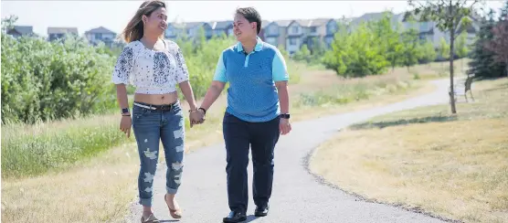  ?? ADRIAN SHELLARD ?? Johnna Marie Labud and Aileen Arieta immediatel­y fell in love with the Chalet No6 townhomes in southeast Calgary and decided to purchase their first home there.