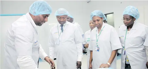  ??  ?? Technical Director Secure ID Ltd Mr Pradeep Kumar, Managing Director/CEO Bank of Industry Mr Rasheed Olaoluwa, Managing Director/CEO Secure ID Mrs Kofo Akinkugbe and Assistant General Manager Large Scale Enterprise­s Mrs Mabel Ndagi during the tour of...