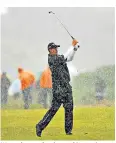  ??  ?? Wet welcome: the changeable weather at the British Open will continue this week