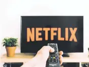  ?? Unsplash via Freestocks ?? Subscriber growth has returned, but Netflix stock prices are down about 40% in the past year.