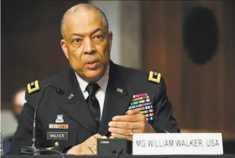  ?? Greg Nash / Associated Press ?? Army Maj. Gen. William Walker, commander of the District of Columbia National Guard, told senators that he could have gotten soldiers into the Capitol within 20 minutes of approval.