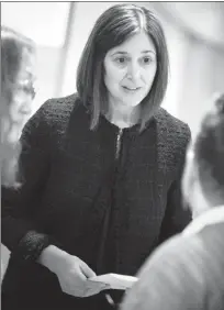  ?? Herald photo by Ian Martens ?? Caroline Hodes talks with members of the audience following her presentati­on, along with fellow University of Lethbridge women and gender studies faculty member Glenda Bonifacio, during the Southern Alberta Council on Public Affairs. @IMartensHe­rald