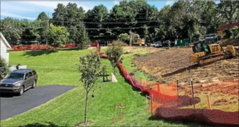  ?? DIGITAL FIRST MEDIA FILE PHOTO ?? Workers clear the way for the Mariner East 2 pipeline beside homes in the Andover developmen­t off Route 352 in Thornbury.