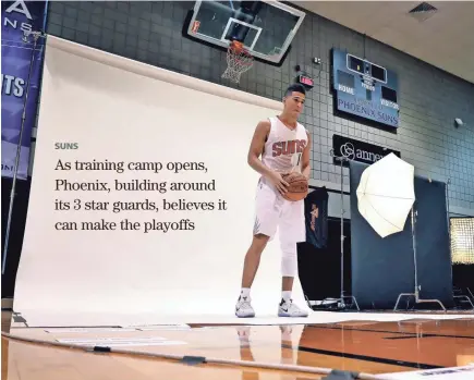  ?? MATT YORK/AP ?? Suns guard Devin Booker poses for a photo during the team’s media day in Phoenix on Monday. The Suns begin a five-day training camp in Flagstaff on Tuesday.