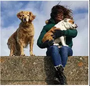  ??  ?? WINDY WALKIES: Kirsty with Elsa and
Brie