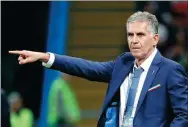  ?? MAXIM SHEMETOV / REUTERS ?? Portugal's Cristiano Ronaldo will face his former national team coach Carlos Queiroz, who is now helming Iran, when the teams clash in Saransk, Russia, on Monday (2 am Tuesday in Beijing).