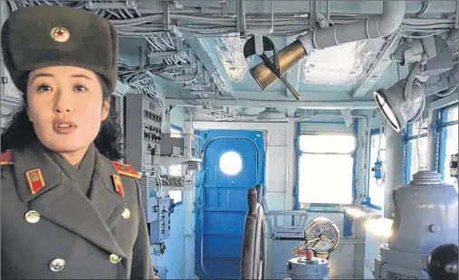  ?? AP PHOTO ?? In this Wednesday, Jan. 24, 2018, photo, a North Korean military guide leads a tour of the USS Pueblo in Pyongyang, North Korea. The Pueblo, an American spy ship, was attacked and captured by North Korea 50 years ago this week. The iconic spy ship, on...