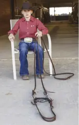  ??  ?? Practice loosening and tightening your reins while off the horse—sit in a chair and lay your bridle out in front of you. You can do this while watching TV, and you’ll gain finger dexterity and muscle memory.