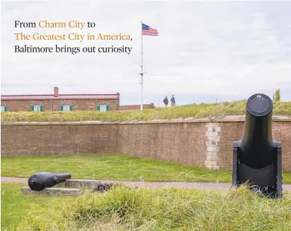  ?? ULYSSES MUÑOZ/BALTIMORE SUN ?? Two people walk around Fort McHenry, the birthplace of The Star-Spangled Banner, exploring the origins behind Baltimore’s slogans.