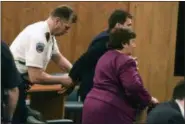 ?? POST STAR VIA AP ?? Alexander West is handcuffed following the reading of the verdict Monday in the fatal boat crash trial in Warren County Court in Queensbury, NY.