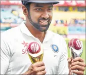  ??  ?? R Ashwin with the Sir Garfield Sobers trophy for ICC cricketer of the Year and ICC Test cricketer of the Year trophy at the HPCA Stadium, in Dharamsala on Tuesday.