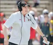  ?? Karl Merton Ferron Baltimore Sun ?? M A RY L A N D coach DJ Durkin is on administra­tive leave while the death of a player is investigat­ed.