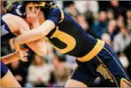  ?? NATE HECKENBERG­ER — FOR MEDIANEWS GROUP ?? Unionville’s John Luzzi gets stuffed by Kennett’s Owen Huffaker before pinning him in the second period at 113 pounds.