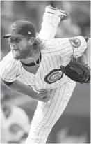  ?? BRIAN CASSELLA/CHICAGO TRIBUNE ?? Cubs closer Craig Kimbrel delivers in the ninth inning during a game in May at Wrigley Field.