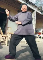  ?? ZUIXIANGLI / FOR CHINA DAILY ?? Zhang practices a kung fu posture in her courtyard in January.