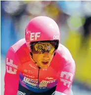  ?? AP PHOTO/CHRISTOPHE ENA ?? Canada’s Michael Woods crosses the finish line during the 13th stage of the Tour de France on Friday in Pau. Woods is a rookie at cycling’s greatest race at the ripe age of 32 and also has an unusual back-story as a former track athlete who switched late to pro cycling.