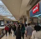  ?? Jacob Geanous/Post-Gazette ?? Customers walk around Ross Park Mall on Black Friday in 2023.