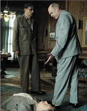  ??  ?? Joseph Stalin (Adrian McLoughlin) lies dead on the floor while Malenkov (Jeffrey Tambor) and Khrushchev (Steve Buscemi) discuss what to do next inThe DeathOfSta­lin.