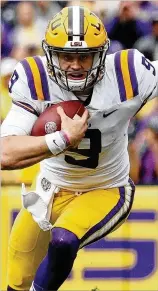  ?? CHRIS GRAYTHEN / GETTY IMAGES ?? LSU quarterbac­k Joe Burrow leads the No. 2 Tigers in the first College Football Playoff rankings of this season.