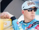  ?? SEAN GARDNER/GETTY ?? Kyle Busch looks on during practice for the AdventHeal­th 400 on Saturday at Kansas Speedway in Kansas City, Kansas.