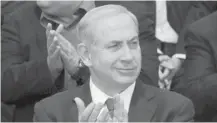  ??  ?? Netanyahu pousse à la colonisati­on