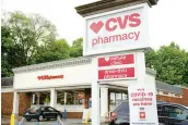  ?? GENE J. PUSKAR/AP ?? A CVS store in Mount Lebanon, Pa., on May 3, 2021. The chain plans to close 900 locations over the next three years.