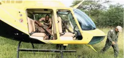  ??  ?? AGAINST POACHING: Rangers prepare to fly by helicopter to their camp along Shire River, inside the Liwonde National Park in Malawi.