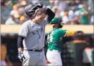  ?? Jeff Chiu / Associated Press ?? The New York Yankees’ Anthony Rizzo reacts after striking out against the Oakland Athletics during the sixth inning on Saturday.