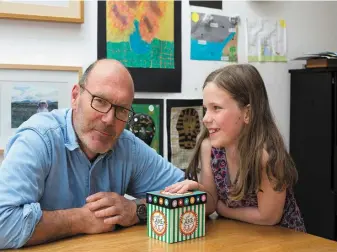  ??  ?? The best things in life are free: Dave Robbins and his daughter Grace, who often makes her dad gifts for Father’s Day. Below: A popular Father’s Day gift of a tin of paint from a not-so-subtle wife