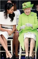  ??  ?? Stylish: Meghan and the Queen