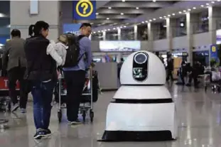  ??  ?? INCHEON: In this photo, LG Electronic­s cleaning robot moves to clean the floor at the Incheon Internatio­nal Airport in Incheon, South Korea.