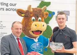  ??  ?? Also at the show: Alan Meston, of Chapelton, Dunnottar, won the Scotch Steak award 2018. Alan’s son Stewart with QMS chairman Jim McLaren and Hamish the Scotch Beef mascot.