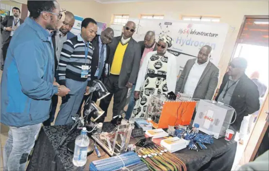  ??  ?? Minister of Science and Technology, Mamoloko Kubayi-Ngubane viewing the demonstrat­ion by Hysa Infrastruc­ture Hydrogen South Africa at the launch of the Hydrogen Fuel Cell Technology system at Poelano High School in Ventersdor­p, North West. Photo: Bruce...