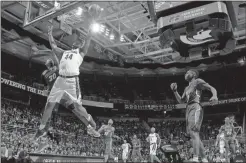  ?? File, Al Goldis / AP ?? Michigan State’s Nick Ward (44) gets a layup against Savannah State’s Jahir Cabeza (30) during the second half.