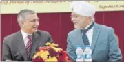  ??  ?? Outgoing Chief Justice of India TS Thakur with CJI-designate Justice JS Khehar at his farewell function in New Delhi. PTI