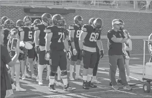  ?? Steven Eckhoff ?? Berry head coach Tony Kunczewski (right) prepares to lead his team onto the field prior to a game last season at Valhalla Stadium.