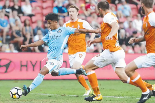  ?? Picture: AAP IMAGE ?? TEEN MACHINE: Daniel Arzani of Melbourne City takes a shot at goal during the round 19 match against Brisbane Roar at Suncorp Stadium on Sunday.